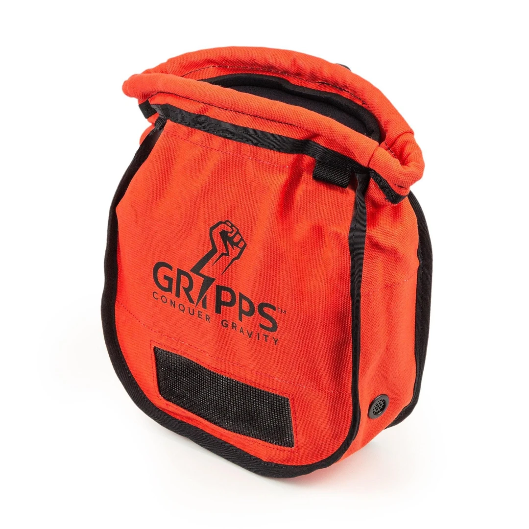 een oranje tasje met de naam gripps erop